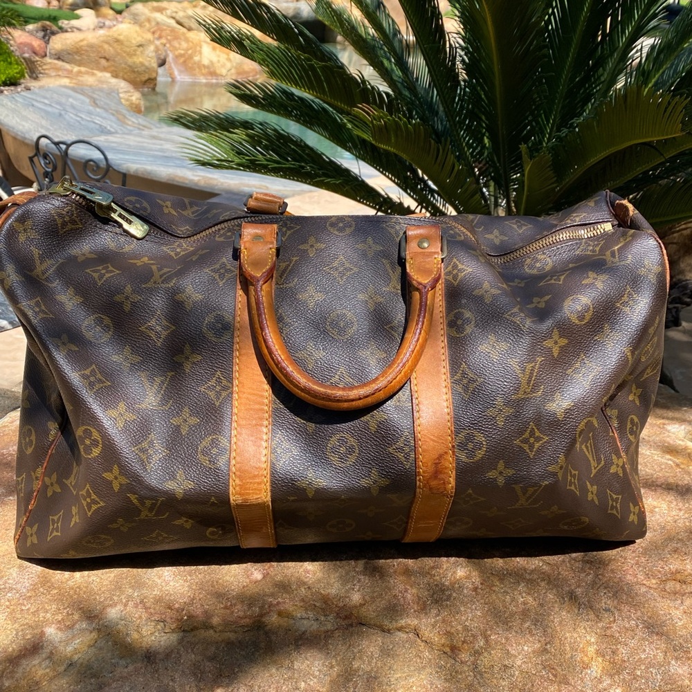 Beautiful Louis Vuitton Keepall traveler 45 monogram LV tote duffel bag